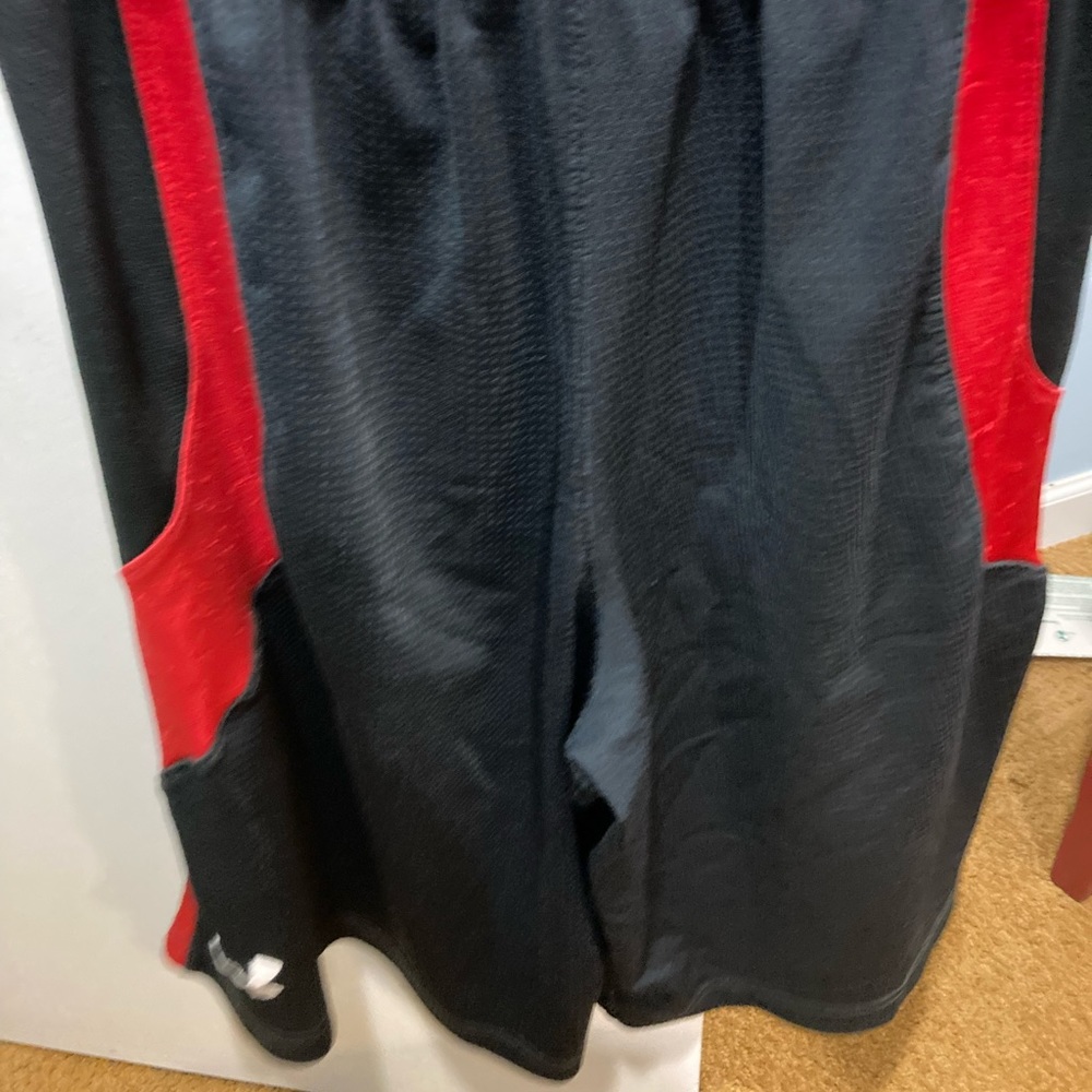 Under Armour size small blue with red stretch sport shorts